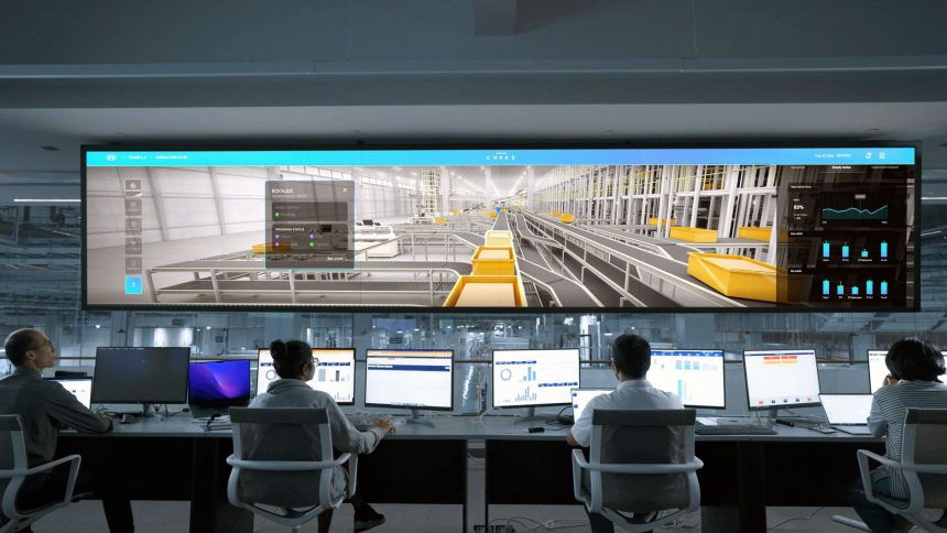 Profissionais monitoram sistemas e painéis digitais em uma moderna central de controle.